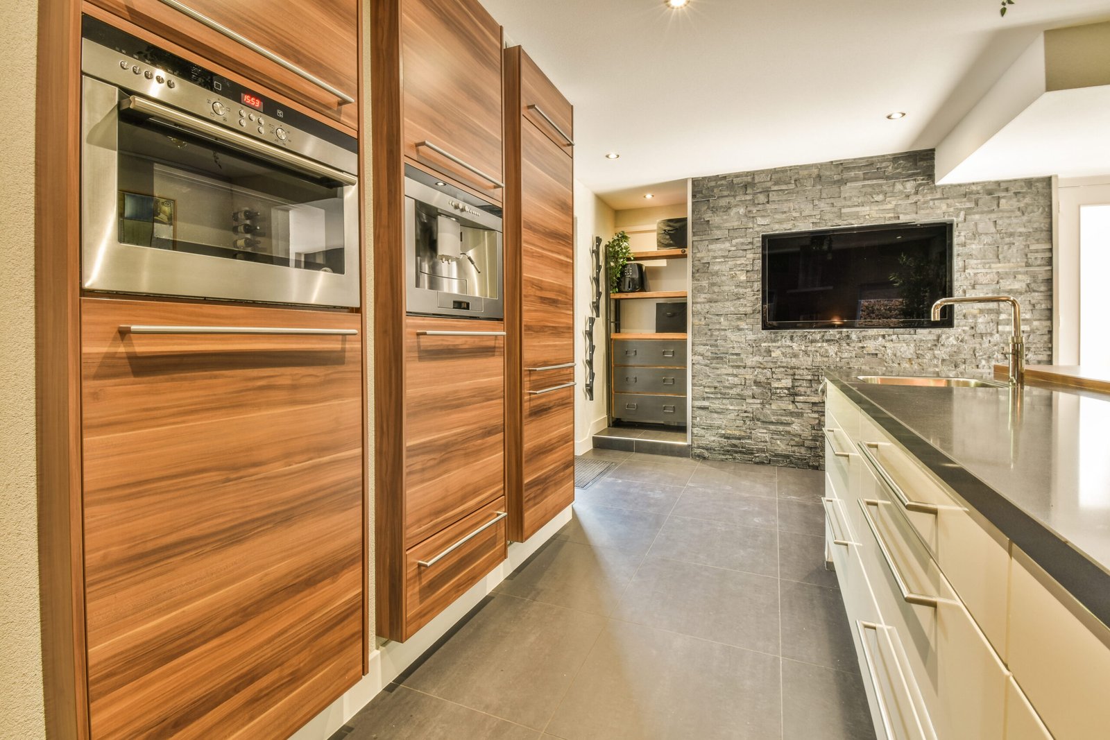 modern-kitchen-interior-with-wood-cabinets-and-sto-2026-01-07-23-15-52-utc